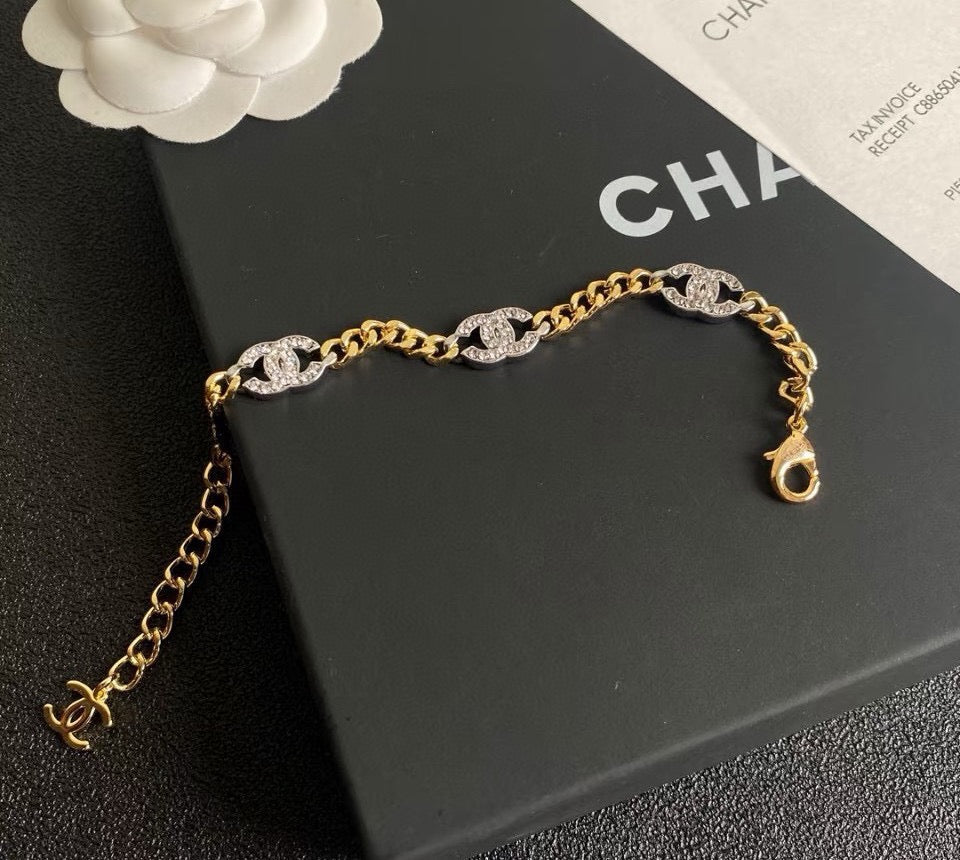 Chanel Silver-Tone Gold-Tone Letter Crystal Accent Chain Bracelet - album image 4