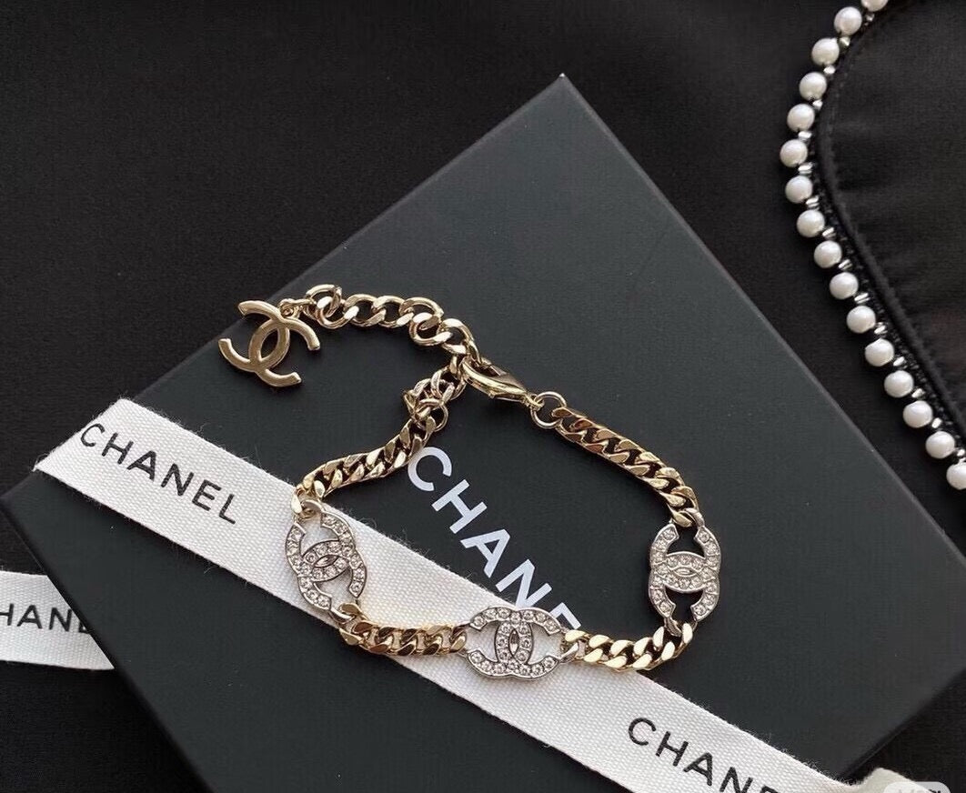 Chanel Silver-Tone Gold-Tone Letter Crystal Accent Chain Bracelet - album image 1