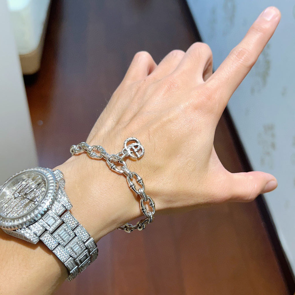 Gucci Silver-Tone Oval Link Bracelet with G Charm - album image 6