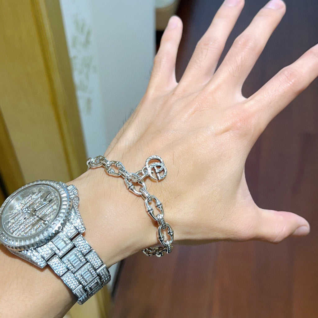 Gucci Silver-Tone Oval Link Bracelet with G Charm - album image 9