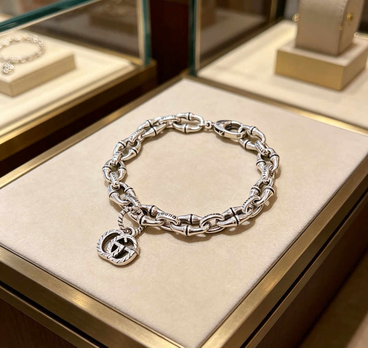Gucci Silver-Tone Oval Link Bracelet with G Charm - album image 2