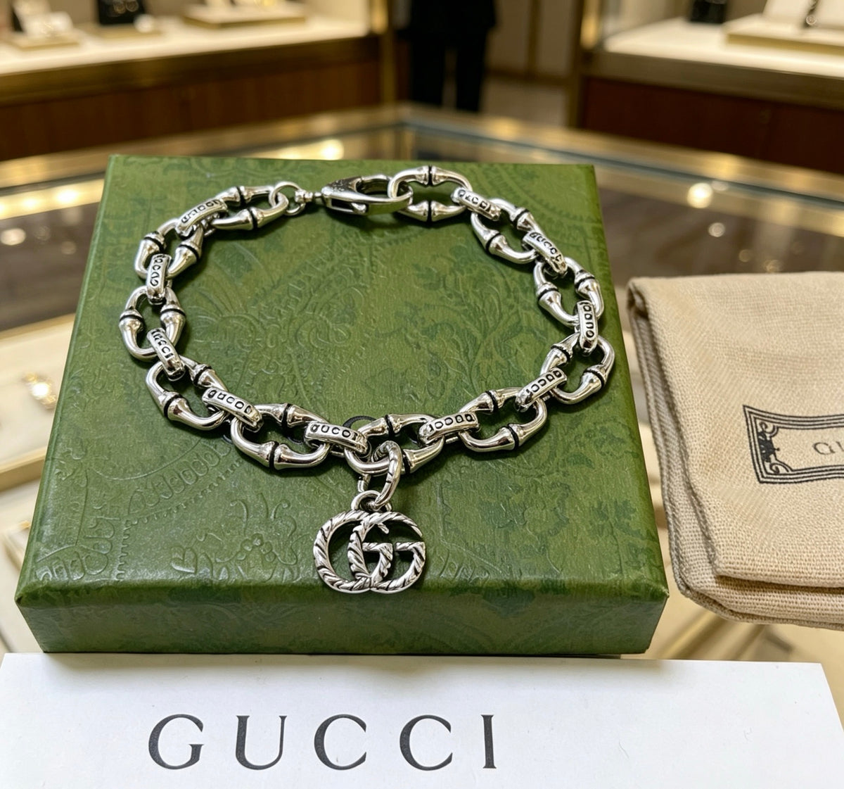 Gucci Silver-Tone Oval Link Bracelet with G Charm - album image 4