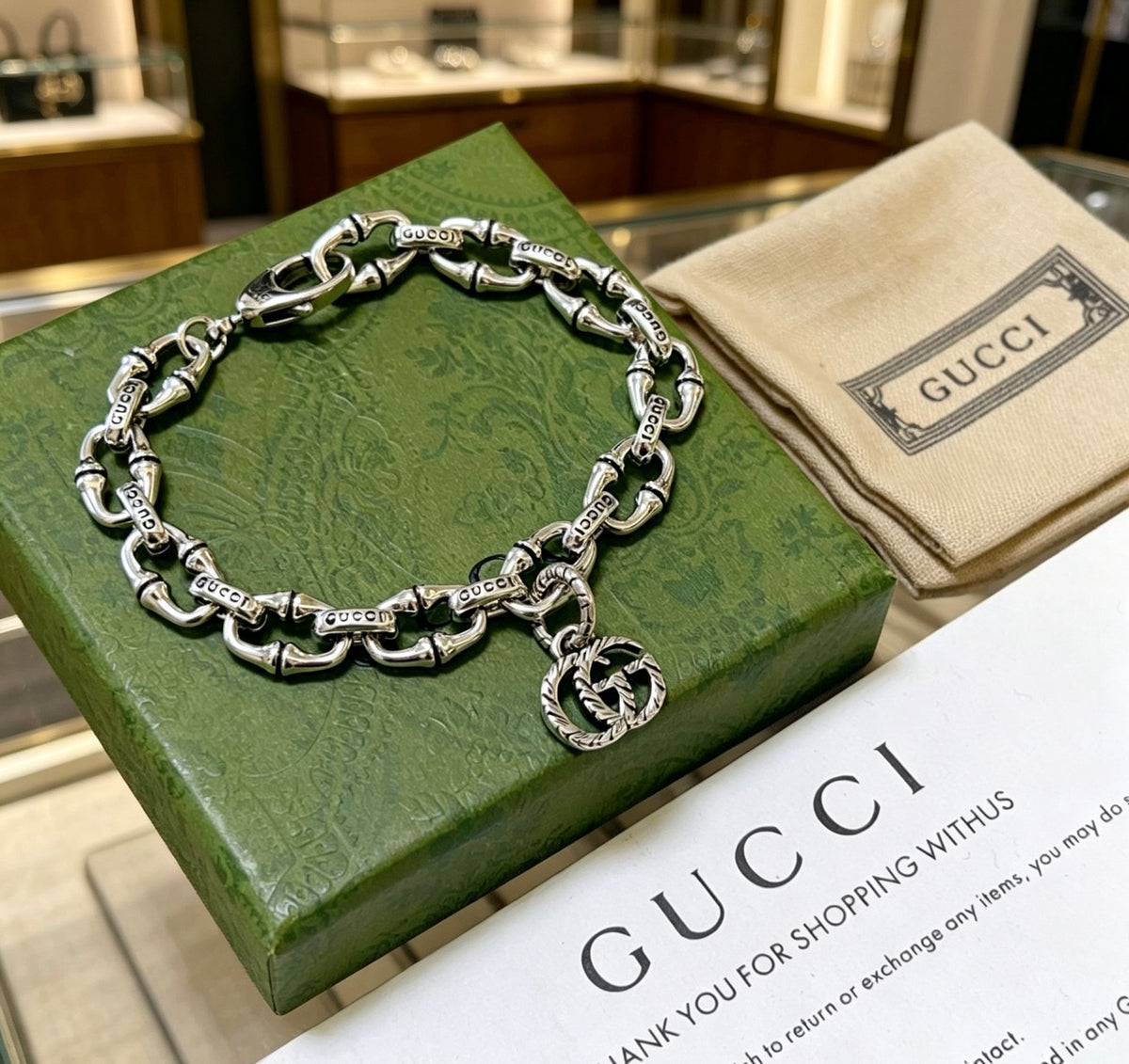 Gucci Silver-Tone Oval Link Bracelet with G Charm - album image 8