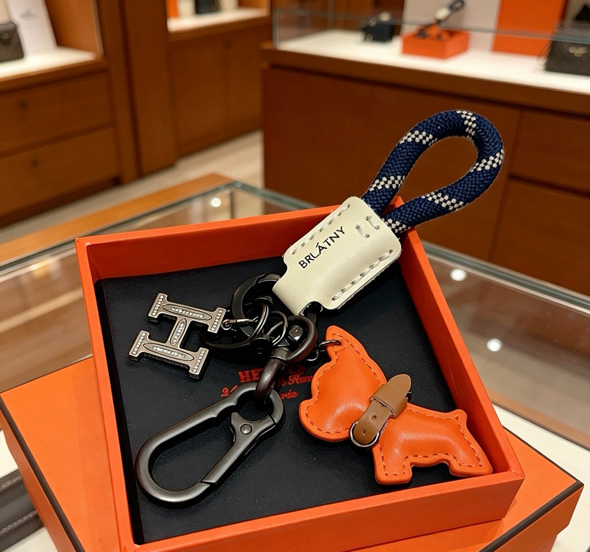 Hermès Orange Horse and H-Charm Keychain with Navy Strap - album image 1