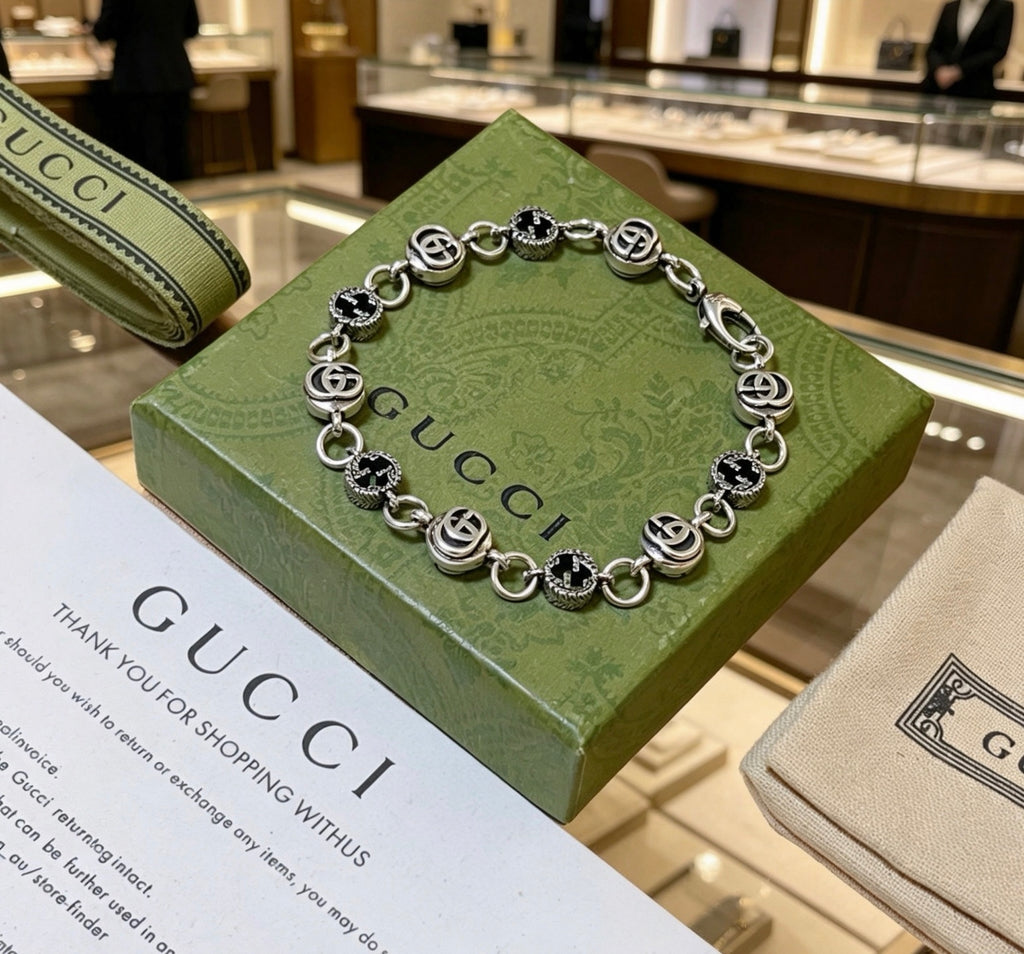 Gucci Silver-Tone GG Medallion Link Bracelet - album image 5