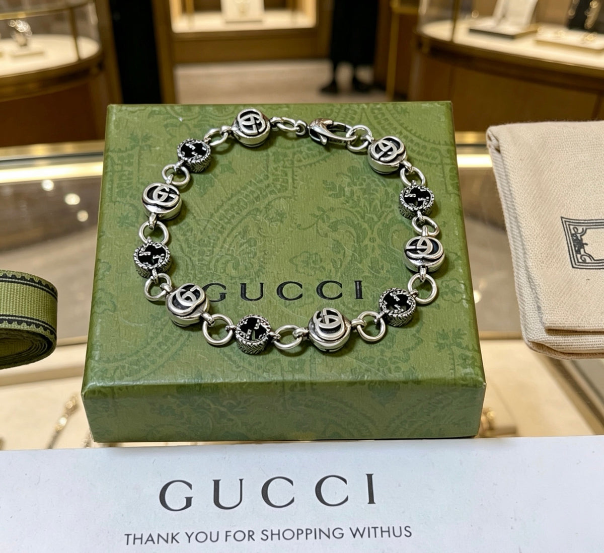 Gucci Silver-Tone GG Medallion Link Bracelet - album image 7