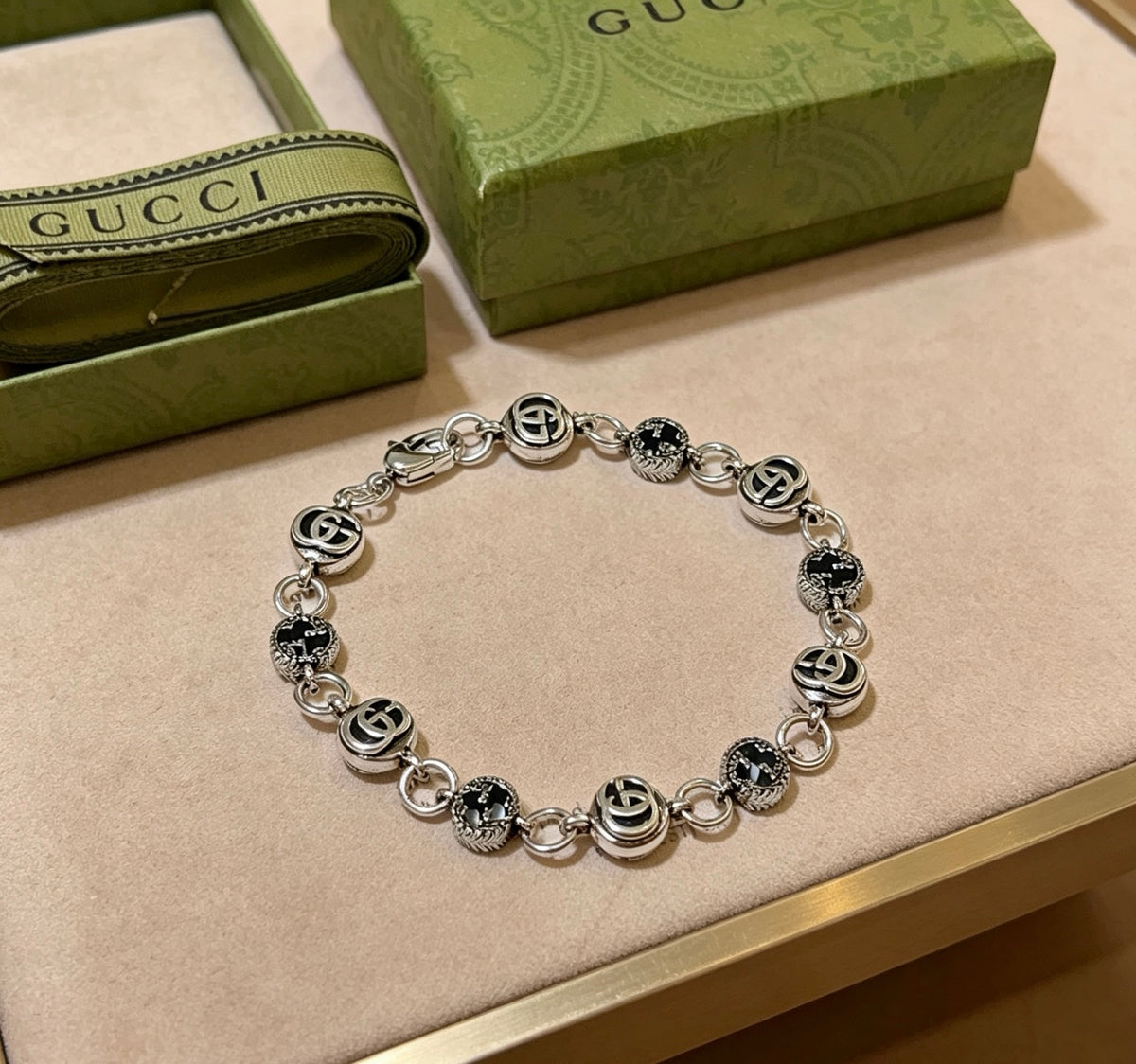 Gucci Silver-Tone GG Medallion Link Bracelet - album image 1