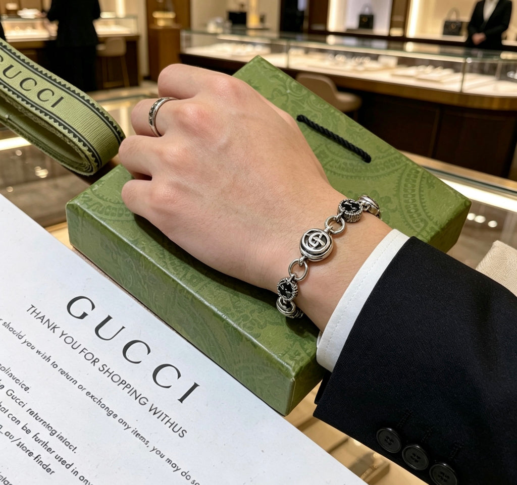 Gucci Silver-Tone GG Medallion Link Bracelet - album image 8