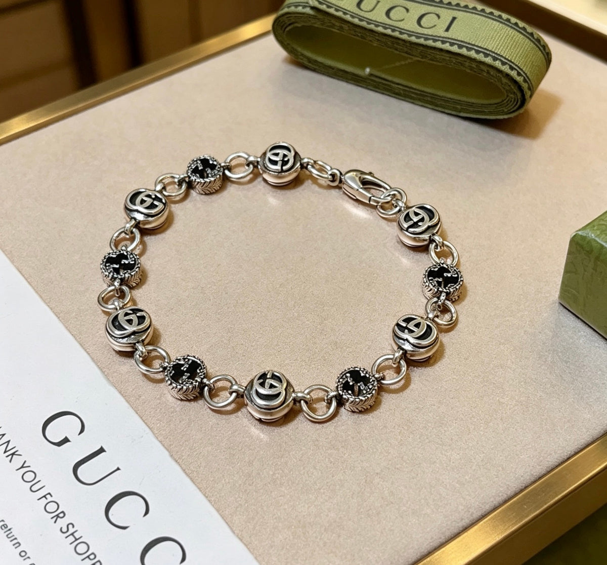Gucci Silver-Tone GG Medallion Link Bracelet - album image 4