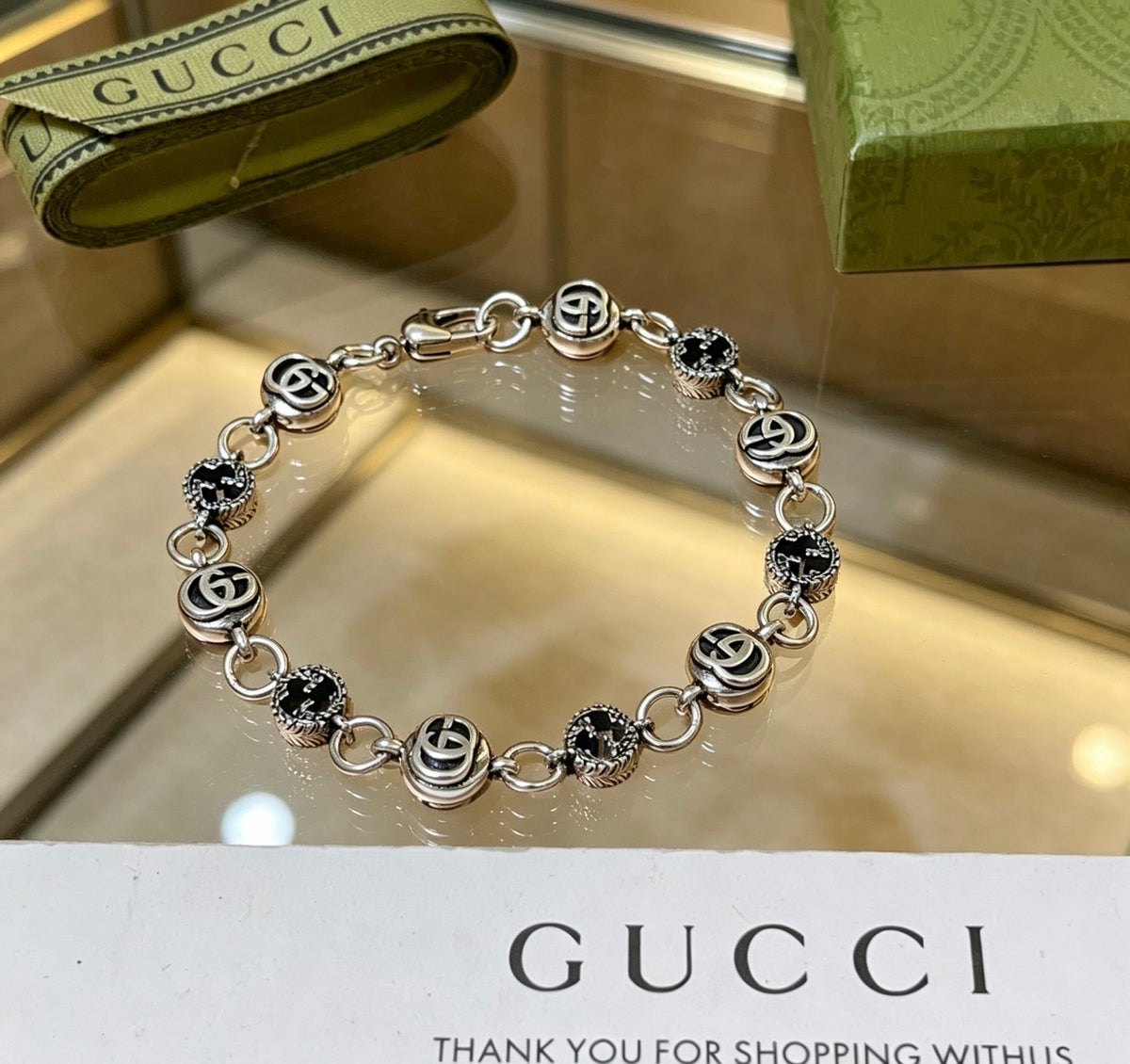 Gucci Silver-Tone GG Medallion Link Bracelet - album image 2