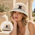 Independent Louis Vuitton Knit Bucket Hat worn by a Western model with product detail inset