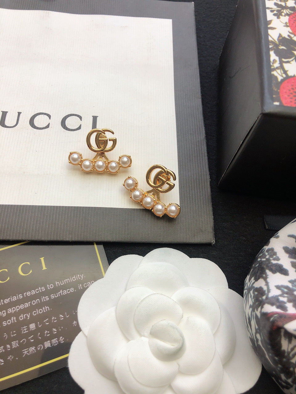 Gucci Gold-Tone GG and Flower Stud Earrings - album image 1