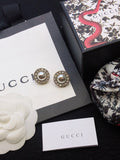 Gucci Gold-Tone Round Medallion Stud Earrings - album image 1