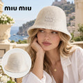 Miu Miu Bucket Hat worn by a model