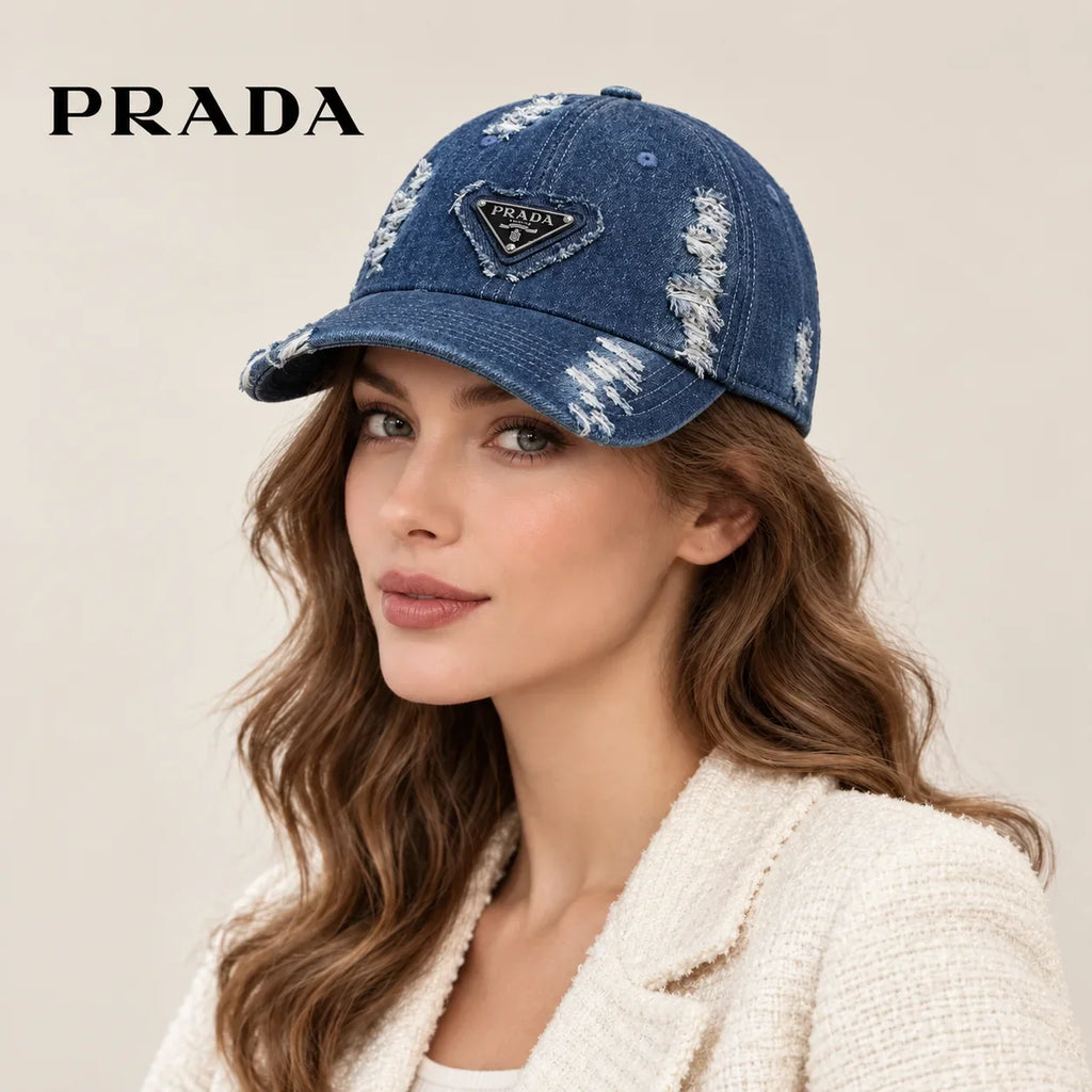 Woman wearing prada denim baseball cap on head