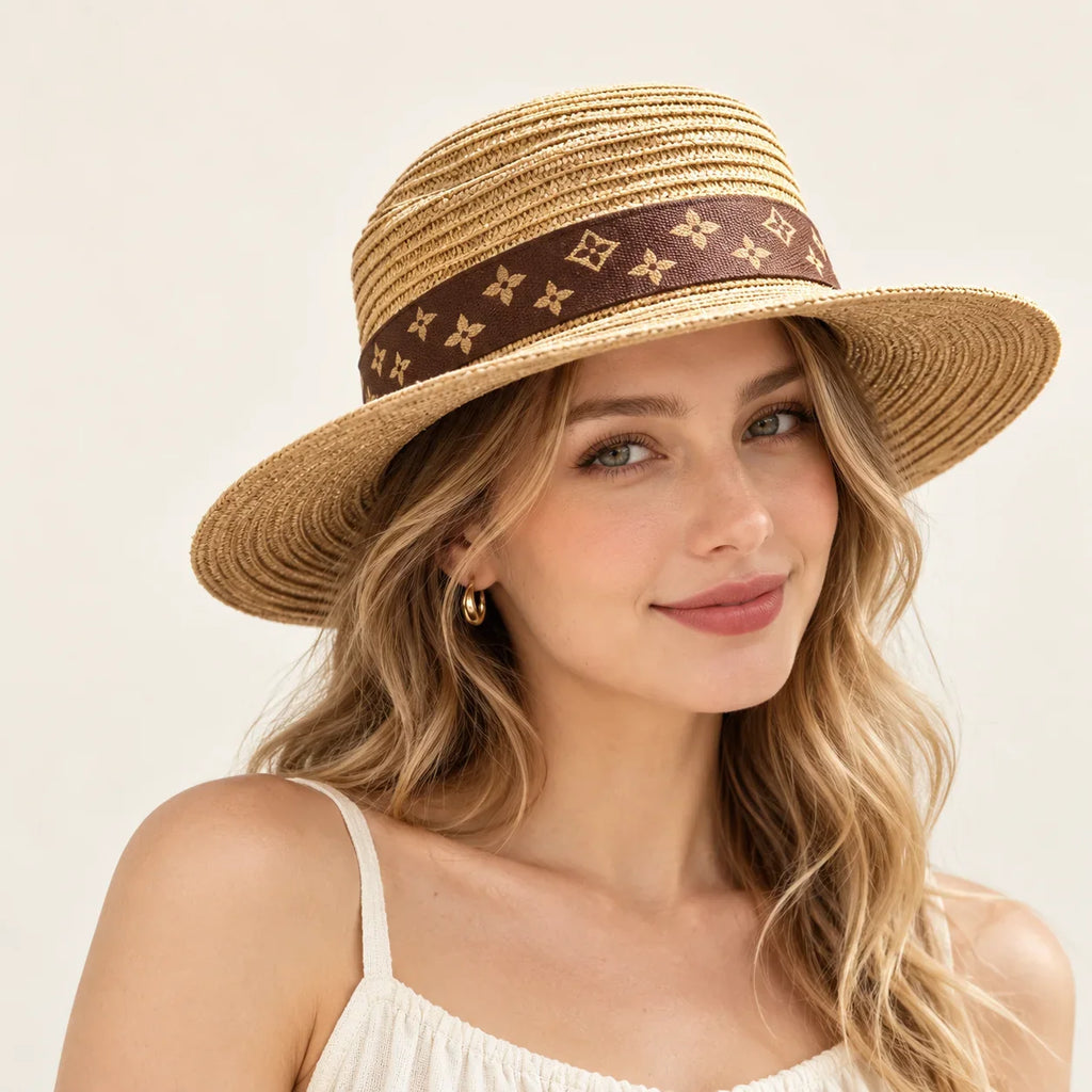 Model wearing woven hat on head